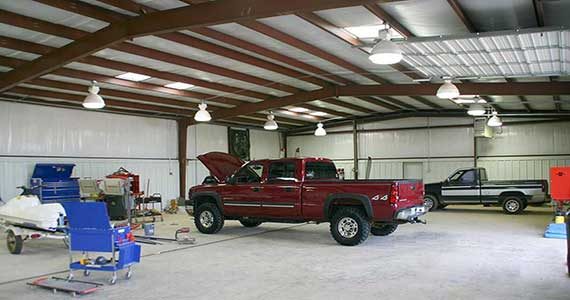 Residential shop-house with living space on one end and a working bay on the other.